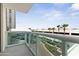 Balcony view overlooking parking and landscaped grounds at 241 Riverside Drive # 409, Daytona Beach, FL 32117