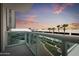 Evening balcony view of city skyline and palm trees at 241 Riverside Drive # 409, Daytona Beach, FL 32117