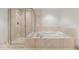 Spa-like bathroom with soaking tub and shower at 241 Riverside Drive # 409, Daytona Beach, FL 32117