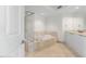 Bathroom with a large soaking tub and shower at 241 Riverside Drive # 409, Daytona Beach, FL 32117