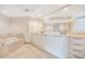 Modern bathroom with double vanity and large mirror at 241 Riverside Drive # 409, Daytona Beach, FL 32117