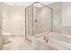 Bathroom with shower, tub, and double vanity at 241 Riverside Drive # 409, Daytona Beach, FL 32117
