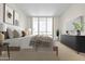 Bedroom with large windows and neutral decor at 241 Riverside Drive # 409, Daytona Beach, FL 32117