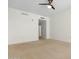 Bright bedroom with carpeted floor and access to balcony at 241 Riverside Drive # 409, Daytona Beach, FL 32117