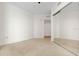 Second bedroom with mirrored closet and neutral decor at 241 Riverside Drive # 409, Daytona Beach, FL 32117