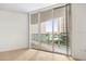 Bedroom with sliding doors to balcony and water views at 241 Riverside Drive # 409, Daytona Beach, FL 32117