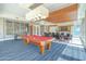 Community game room features a pool table and other games at 241 Riverside Drive # 409, Daytona Beach, FL 32117