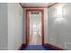 Interior hallway with wood floors and access to living area at 241 Riverside Drive # 409, Daytona Beach, FL 32117