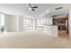 Spacious living room with carpet flooring and ceiling fan at 241 Riverside Drive # 409, Daytona Beach, FL 32117