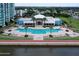 Community pool with ample deck space for lounging at 241 Riverside Drive # 409, Daytona Beach, FL 32117