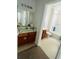 Guest bathroom with tub, toilet and vanity at 2600 Lodi Cir # 101, Kissimmee, FL 34746
