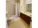 Bathroom with tub/shower and double vanity at 2600 Lodi Cir # 101, Kissimmee, FL 34746
