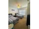 Bedroom with two twin beds and window coverings at 2600 Lodi Cir # 101, Kissimmee, FL 34746