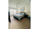 Spacious bedroom with large bed and window coverings at 2600 Lodi Cir # 101, Kissimmee, FL 34746