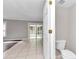 Small bathroom with toilet and access to patio at 2718 Se 45Th Ave, Ocala, FL 34480