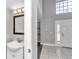 Clean and updated half bathroom with modern vanity and mirror at 2718 Se 45Th Ave, Ocala, FL 34480