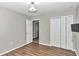 Bedroom with wood floor and closet at 2718 Se 45Th Ave, Ocala, FL 34480