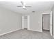 Spacious bedroom with ceiling fan and large closet at 2718 Se 45Th Ave, Ocala, FL 34480
