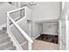 Bright entryway with staircase, tile flooring, and view of dining area at 2718 Se 45Th Ave, Ocala, FL 34480