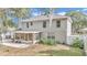 Two-story house with a screened porch and a large backyard at 2718 Se 45Th Ave, Ocala, FL 34480