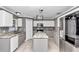 Modern kitchen with island, stainless steel appliances, and granite countertops at 2718 Se 45Th Ave, Ocala, FL 34480