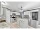 Modern kitchen with island, stainless steel appliances, and granite countertops at 2718 Se 45Th Ave, Ocala, FL 34480