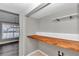 Laundry area with butcher block countertop and shelving at 2718 Se 45Th Ave, Ocala, FL 34480