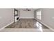 Spacious living room with fireplace and wood-like flooring at 2718 Se 45Th Ave, Ocala, FL 34480