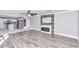Spacious living room with fireplace and wood-look flooring at 2718 Se 45Th Ave, Ocala, FL 34480