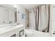 Clean bathroom with tub shower and updated vanity at 273 Scottsdale Sq # 273, Winter Park, FL 32792