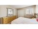 Bedroom with double closet and wood flooring, plus dresser at 273 Scottsdale Sq # 273, Winter Park, FL 32792