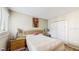 Well-lit bedroom with double closet and wood flooring at 273 Scottsdale Sq # 273, Winter Park, FL 32792
