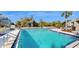 Large community pool with ample deck space at 273 Scottsdale Sq # 273, Winter Park, FL 32792