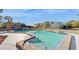 Refreshing community pool with surrounding patio at 273 Scottsdale Sq # 273, Winter Park, FL 32792