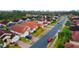 Residential neighborhood with houses and palm trees at 308 Robin Rd, Davenport, FL 33896
