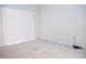 Bedroom with sliding door and blinds at 308 Robin Rd, Davenport, FL 33896