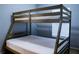 Bedroom with bunk bed and window at 308 Robin Rd, Davenport, FL 33896