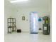 Garage with laundry hookups and extra storage at 308 Robin Rd, Davenport, FL 33896