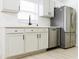 Modern kitchen with stainless steel appliances and light cabinets at 308 Robin Rd, Davenport, FL 33896
