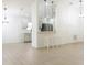 Open concept kitchen with light gray cabinets and stainless steel appliances at 308 Robin Rd, Davenport, FL 33896