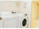 Laundry room with washer and dryer at 308 Robin Rd, Davenport, FL 33896