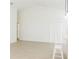Spacious living room with light flooring and high ceilings at 308 Robin Rd, Davenport, FL 33896