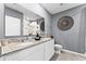 Main bathroom with double sinks, granite countertop, and toilet at 3326 Private Oak Dr, Apopka, FL 32703