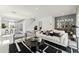 Elegant living room with a black and white rug and comfy seating at 3326 Private Oak Dr, Apopka, FL 32703