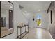 Bright and airy entryway with tile floors and a full-length mirror at 3332 Private Oak Dr, Apopka, FL 32703