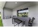 Covered patio with seating area and view of nature at 3332 Private Oak Dr, Apopka, FL 32703