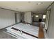 Open living room with access to kitchen and other rooms at 3548 Valley Trl, Lakeland, FL 33810