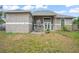 Large backyard with fenced perimeter at 430 Magpie Ct, Kissimmee, FL 34759