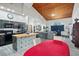 Open concept kitchen boasts an island with patterned tile and wood countertop at 430 Magpie Ct, Kissimmee, FL 34759
