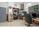 Bright office with built-in shelving and desk at 430 Magpie Ct, Kissimmee, FL 34759